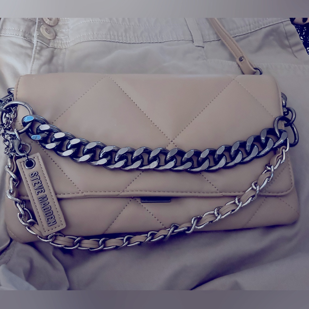 Steve Madden Clutch with strap. Brand new without tags…never used.